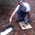 Omar Helms with cast of a Bigfoot footprint in Florida.