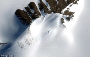 Is this dark shape a UFO that has crashed in the antarctic ice?